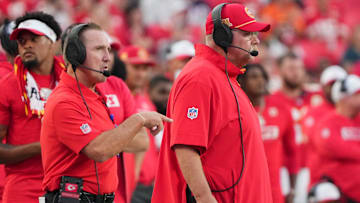 Aug 22, 2024; Kansas City, Missouri, USA; Kansas City Chiefs defensive coordinator Steve Spagnuolo, left and head coach Andy Reid watch play against the Chicago Bears during the game at GEHA Field at Arrowhead Stadium. Mandatory Credit: Denny Medley-Imagn Images