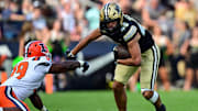 Purdue Boilermakers running back Devin Mockobee (45) runs with the ball 