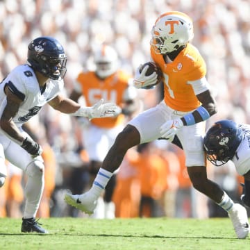 Tennessee wide receiver Dont'e Thornton Jr. (1) runs the ball during a NCAA college football game between Tennessee and Connecticut at Neyland Stadium in Knoxville, Tenn., on Saturday, Nov. 4, 2023.
