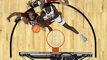 Mar 27, 2025; San Francisco, CA, USA; Texas Tech Red Raiders forward Federiko Federiko (33), Arkansas Razorbacks forward Jonas Aidoo (9) and forward Trevon Brazile (4) battle for control of a rebound during the second half during a West Regional semifinal of the 2025 NCAA tournament at Chase Center. Mandatory Credit: Eakin Howard-Imagn Images