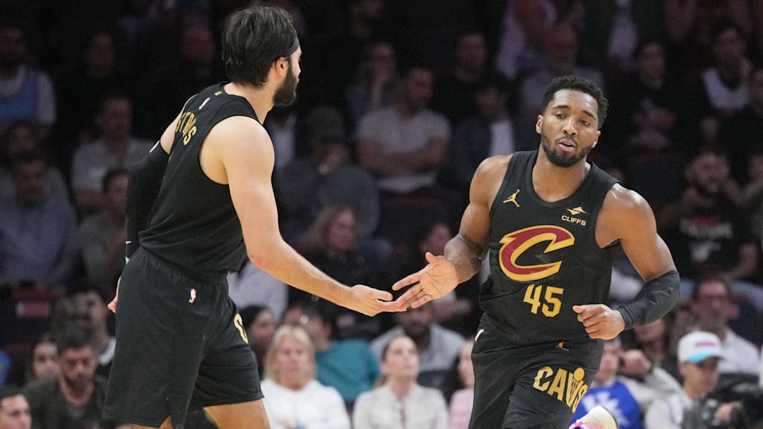 Jan 29, 2025; Miami, Florida, USA; Cleveland Cavaliers guard Donovan Mitchell (45) is congratulated by guard Max Strus (1) after scoring against the Miami Heat during the second half at Kaseya Center. Mandatory Credit: Jim Rassol-Imagn Images Jan 29, 2025; Miami, Florida, USA; Cleveland Cavaliers guard Donovan Mitchell (45) is congratulated by guard Max Strus (1) after scoring against the Miami Heat during the second half at Kaseya Center. Mandatory Credit: Jim Rassol-Imagn Images