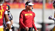 Nov 16, 2024; Los Angeles, California, USA; Southern California Trojans head coach Lincoln Riley watches game action against the Nebraska Cornhuskers during the first half at the Los Angeles Memorial Coliseum. Mandatory Credit: Gary A. Vasquez-Imagn Images