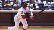 New York City, New York, USA; New York Mets left fielder Starling Marte (6) singles during the third inning against the New York Yankees at Citi Field.