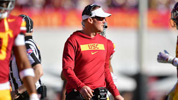 Nov 16, 2024; Los Angeles, California, USA; Southern California Trojans head coach Lincoln Riley watches game action against the Nebraska Cornhuskers during the first half at the Los Angeles Memorial Coliseum. Mandatory Credit: Gary A. Vasquez-Imagn Images