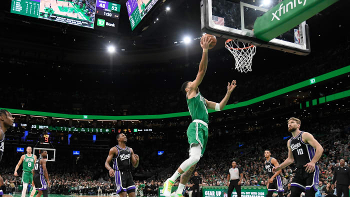 Apr 5, 2024; Boston, Massachusetts, USA; Boston Celtics forward Jayson Tatum (0) shoots the ball vs. the Sacramento Kings.