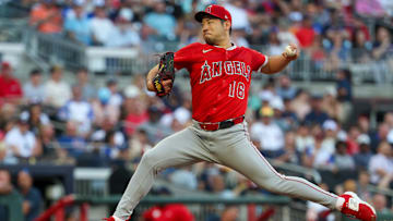 Jul 2, 2025; Atlanta, Georgia, USA; Los Angeles Angels starting pitcher Yusei Kikuchi (16) throws against the Atlanta Braves in the second inning at Truist Park. Mandatory Credit: Brett Davis-Imagn Images