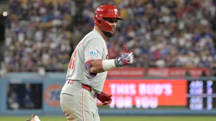 Aug 7, 2024; Los Angeles, California, USA;  Philadelphia Phillies designated hitter Kyle Schwarber (12) rounds the bases after a three-run home run in the sixth inning against the Los Angeles Dodgers at Dodger Stadium.