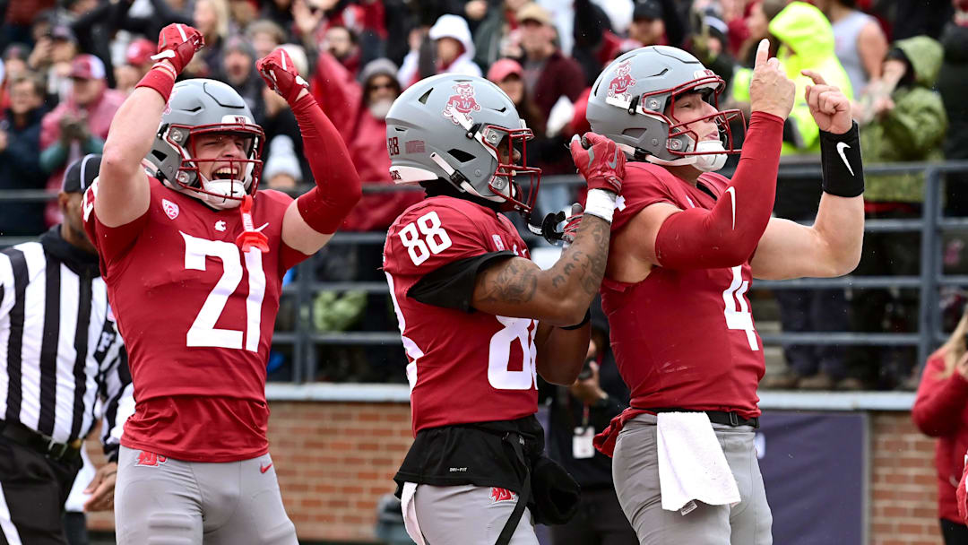 Oct 25, 2025; Pullman, Washington, USA; Washington State Cougars quarterback Zevi Eckhaus (4) celebrates after a touchdown against the Toledo Rockets in the first half at Gesa Field at Martin Stadium. Mandatory Credit: James Snook-Imagn Images