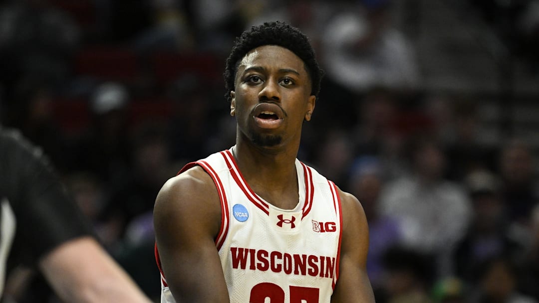 Mar 19, 2026; Portland, OR, USA; Wisconsin Badgers guard John Blackwell (25) reacts during the second half of a first round game of the men's 2026 NCAA Tournament against the High Point Panthers at Moda Center. Mandatory Credit: Troy Wayrynen-Imagn Images