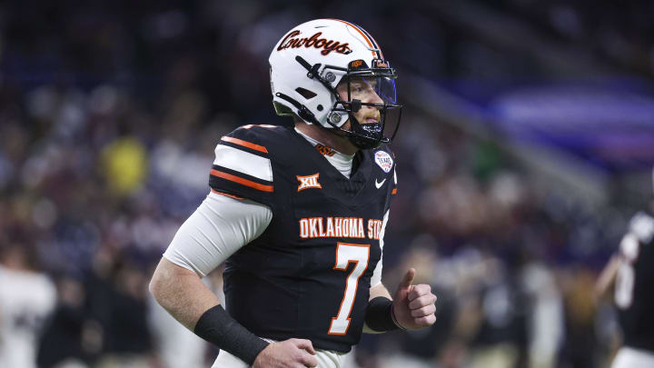 Dec 27, 2023; Houston, TX, USA; Oklahoma State Cowboys quarterback Alan Bowman (7) before the game against the Texas A&M Aggies at NRG Stadium. Mandatory Credit: Troy Taormina-USA TODAY Sports