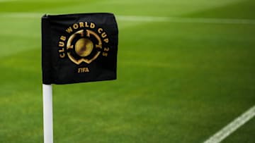 A branded corner kick flag depicting the logo of FIFA Club...