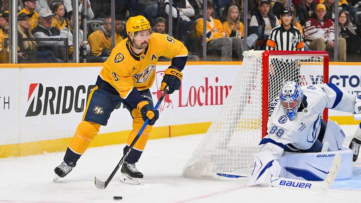 Oct 28, 2025; Nashville, Tennessee, USA; Nashville Predators left wing Filip Forsberg (9) skates behind the net against the Tampa Bay Lightning during the third period at Bridgestone Arena. Mandatory Credit: Steve Roberts-Imagn Images Oct 28, 2025; Nashville, Tennessee, USA; Nashville Predators left wing Filip Forsberg (9) skates behind the net against the Tampa Bay Lightning during the third period at Bridgestone Arena. Mandatory Credit: Steve Roberts-Imagn Images
