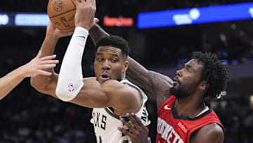 Nov 9, 2025; Milwaukee, Wisconsin, USA; Milwaukee Bucks forward Giannis Antetokounmpo (34) drives to the basket against Houston Rockets forward Tari Eason (17) in the second half at Fiserv Forum. Mandatory Credit: Michael McLoone-Imagn Images