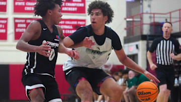 Sunnyslope forward Darius Wabbington (21) drives against St. Mary’s guard Noah Ondoua (10) during the boys PrimeTime basketball championship in Phoenix, on June 14, 2025.