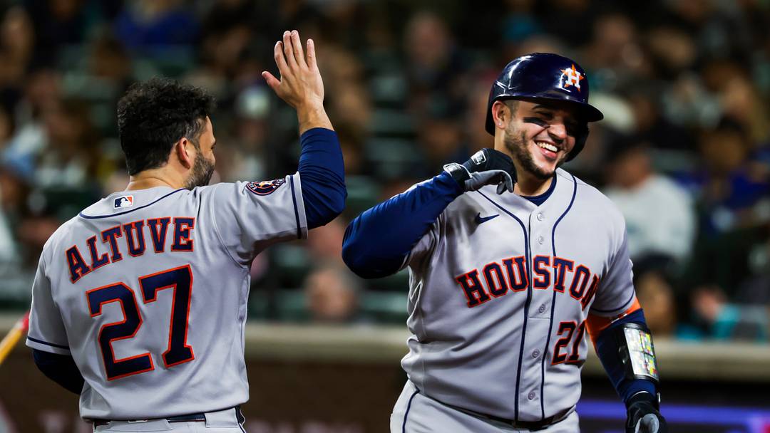  Houston Astros catcher Yainer Diaz (21) high-fives second baseman Jose Altuve (27) after hitting a two-run home run  Credit: Joe Nicholson-Imagn Images