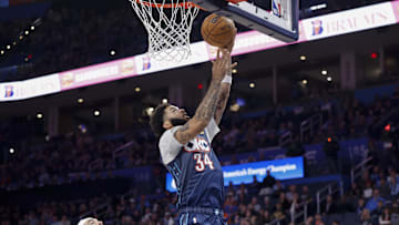 Dec 5, 2025; Oklahoma City, Oklahoma, USA; Oklahoma City Thunder guard Kenrich Williams (34) goes up for a basket against the Dallas Mavericks during the second half at Paycom Center. Mandatory Credit: Alonzo Adams-Imagn Images
