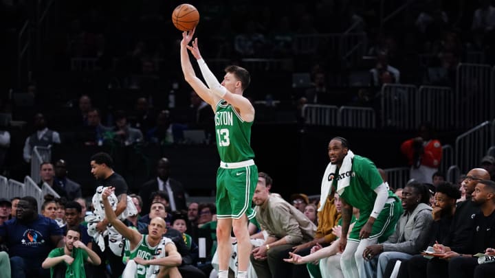 Apr 12, 2024; Boston, Massachusetts, USA; Boston Celtics forward Drew Peterson (13) shoots for three points against the Charlotte Hornets in the second half at TD Garden. Mandatory Credit: David Butler II-USA TODAY Sports