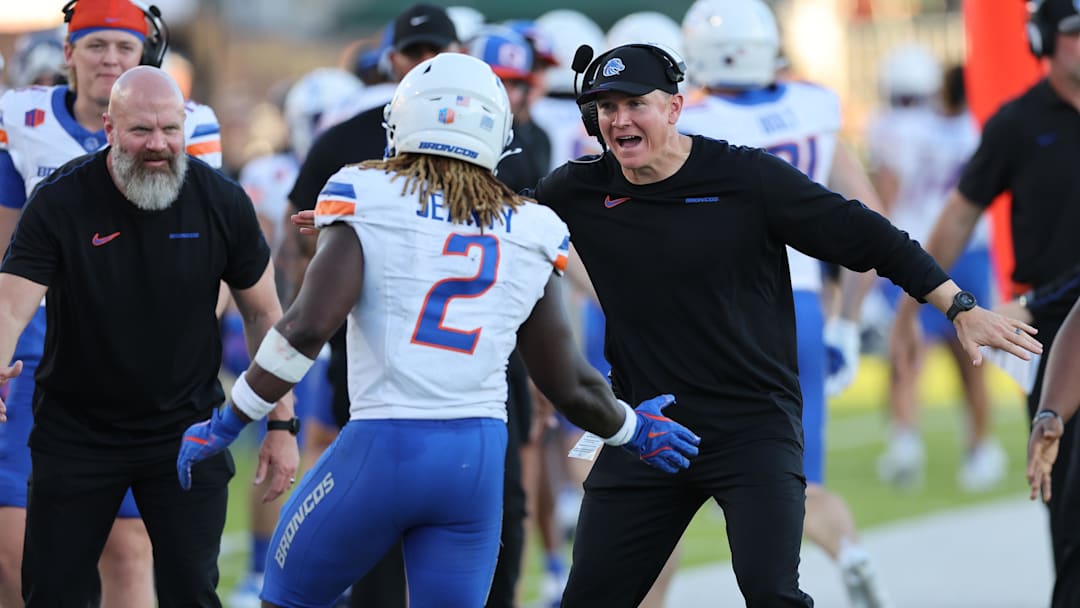  Boise State Broncos head coach Spencer Danielson reacts with running back Ashton Jeanty (2) after a touchdown during the first quarter against the Hawaii Rainbow Warriors