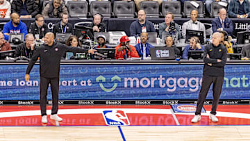 Nov 17, 2025; Detroit, Michigan, USA: Detroit Pistons head coach J.B. Bickerstaff points over at Indiana Pacers head coach Rick Carlisle during the second half at Little Caesars Arena. Mandatory Credit: David Reginek-Imagn Images