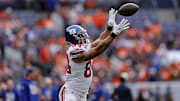 Oct 19, 2025; Denver, Colorado, USA; New York Giants tight end Theo Johnson (84) warms up before the game against the Denver Broncos at Empower Field at Mile High. 