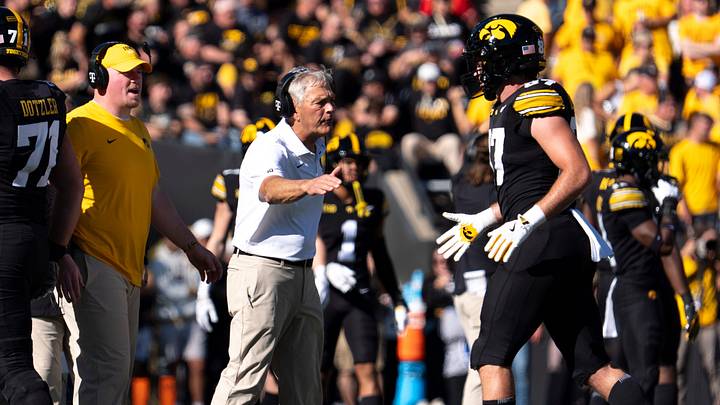 Iowa Hawkeyes head coach Kirk Ferentz high fives Iowa Hawkeyes tight end Addison Ostrenga (87) during a Big Ten college football game against the Ohio State Buckeyes Oct. 3, 2026 at Kinnick Stadium in Iowa City, Iowa.