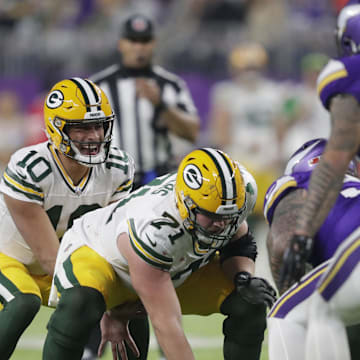 Dec 31, 2023; Minneapolis, Minnesota, USA; Green Bay Packers quarterback Jordan Love (10) runs the offense against the Minnesota Vikings during their game at U.S. Bank Stadium. Mandatory Credit: Dan Powers-Imagn Images