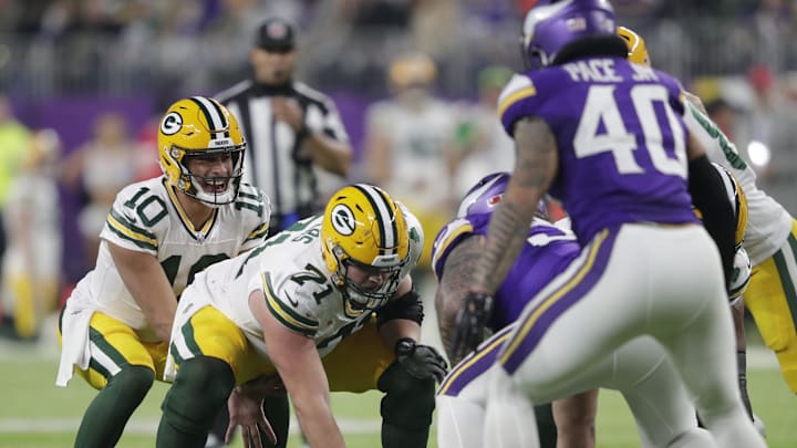 Dec 31, 2023; Minneapolis, Minnesota, USA; Green Bay Packers quarterback Jordan Love (10) runs the offense against the Minnesota Vikings during their game at U.S. Bank Stadium. Mandatory Credit: Dan Powers-Imagn Images