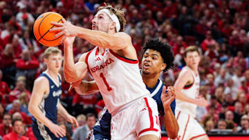 Nebraska Cornhuskers guard Sam Hoiberg shoots the ball against Creighton Bluejays guard Austin Swartz.