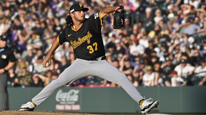 Pittsburgh Pirates pitcher Jared Jones (37) delivers a pitch in the third inning against the Colorado Rockies at Coors Field. 