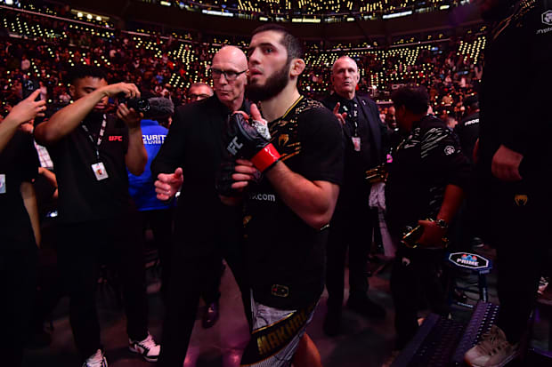 Islam Makhachev leaves the Octagon after defeating Renato Moicano in a lightweight title fight during UFC 311 at Intuit Dome.