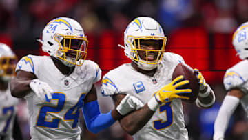Dec 1, 2024; Atlanta, Georgia, USA; Los Angeles Chargers safety Derwin James Jr. (3) celebrates with safety Marcus Maye (24) and cornerback Tarheeb Still (29) after an interception against the Atlanta Falcons in the fourth quarter at Mercedes-Benz Stadium. Mandatory Credit: Brett Davis-Imagn Images