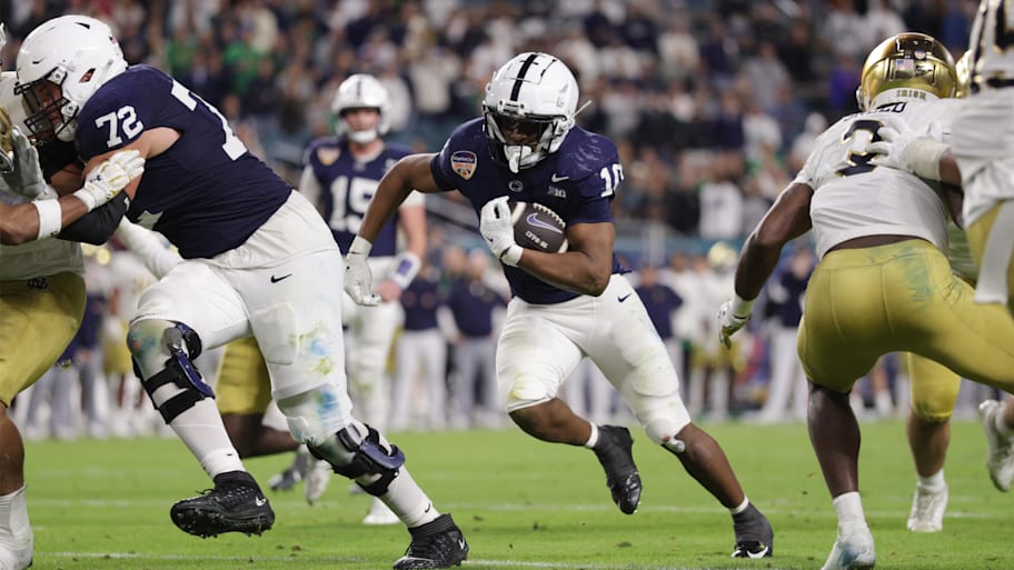 Penn State running back Nicholas Singleton carries the football during a Playoff game against Notre Dame.