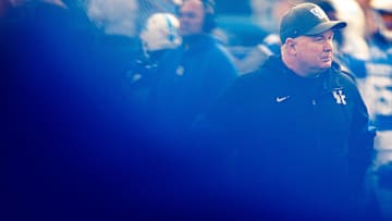 Nov 16, 2024; Lexington, Kentucky, USA; Kentucky Wildcats head coach Mark Stoops stands on the field before the game against the Murray State Racers at Kroger Field. Mandatory Credit: Jordan Prather-Imagn Images