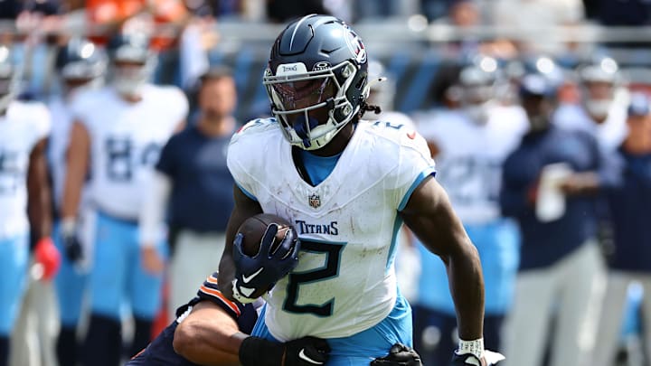 Sep 8, 2024; Chicago, Illinois, USA; Tennessee Titans running back Tyjae Spears (2) makes a catch against the Chicago Bears during the first quarter at Soldier Field. Mandatory Credit: Mike Dinovo-Imagn Images