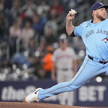 Apr 30, 2025; Toronto, Ontario, CAN; Toronto Blue Jays starting pitcher Yariel Rodriguez (29) pitches to the Boston Red Sox during the first inning at Rogers Centre.