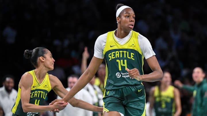 Jul 6, 2025; Brooklyn, New York, USA; Seattle Storm guard Skylar Diggins (4) congratulates center Dominique Malonga (14) during the second half against the New York Liberty at Barclays Center. Jul 6, 2025; Brooklyn, New York, USA; Seattle Storm guard Skylar Diggins (4) congratulates center Dominique Malonga (14) during the second half against the New York Liberty at Barclays Center.