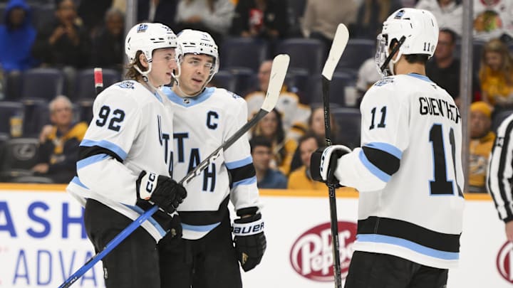 Utah Hockey Club center Logan Cooley celebrates a goal with his teammates against the Nashville Predators.