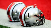 Sep 6, 2014; Columbus, OH, USA; Ohio State Buckeyes helmets on the field against the Virginia Tech Hokies at Ohio Stadium. Virginia Tech defeated Ohio State 35-21. Mandatory Credit: Andrew Weber-Imagn Images
