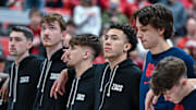 Jalen Warley (fourth from left) lines up alongside Gonzaga players before tipoff.