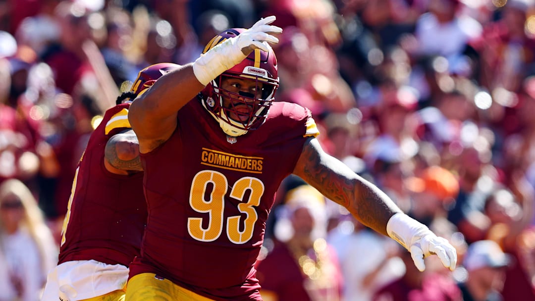 Oct 6, 2024; Landover, Maryland, USA; Washington Commanders defensive tackle Jonathan Allen (93) celebrates after a tackle during the second quarter against the Cleveland Browns at NorthWest Stadium. Mandatory Credit: Peter Casey-Imagn Images