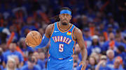 May 18, 2025; Oklahoma City, Oklahoma, USA; Oklahoma City Thunder guard Luguentz Dort (5) dribbles down the court against the Denver Nuggets in the second half during game seven of the second round for the 2025 NBA Playoffs at Paycom Center. Mandatory Credit: Alonzo Adams-Imagn Images