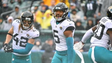 Oct 2, 2022; Philadelphia, Pennsylvania, USA; Jacksonville Jaguars safety Andre Cisco celebrates his interception return for a touchdown with teammates against the  Philadelphia Eagles during the first quarter at Lincoln Financial Field. Mandatory Credit: Eric Hartline-USA TODAY Sports