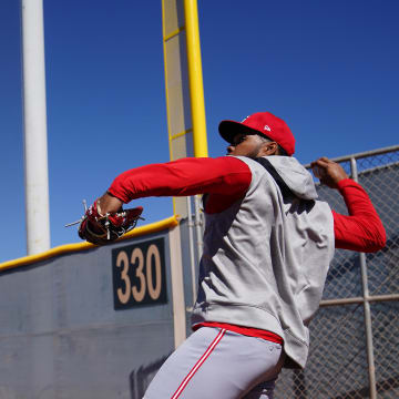Cincinnati Reds non-roster invitee outfielder Rece Hinds throws from right field during spring training workouts at Goodyear Ballpark in 2024.