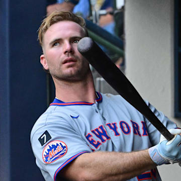 Milwaukee, Wisconsin, USA; New York Mets first baseman Pete Alonso (20) gets ready to bat in the first inning against the Milwaukee Brewers at American Family Field.