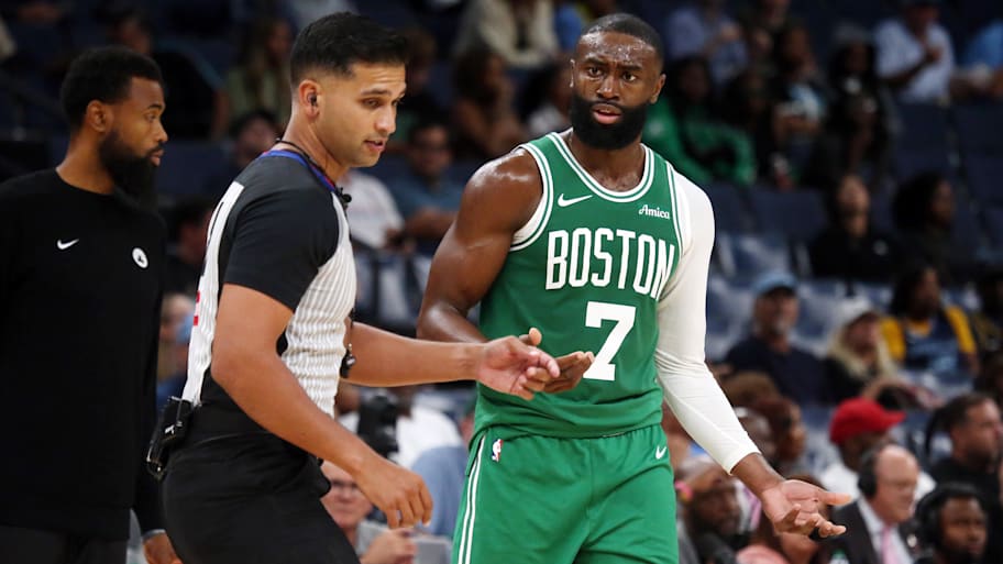 Boston Celtics guard Jaylen Brown reacts toward an official after a technical foul call.