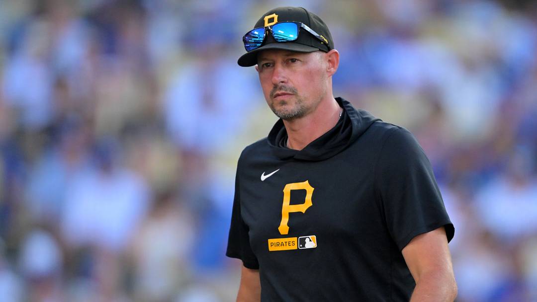 Aug 22, 2026; Los Angeles, California, USA;Pittsburgh Pirates manager Don Kelly (12) walks to the dugout after a pitching change against the Los Angeles Dodgers at Dodger Stadium. Mandatory Credit: Jayne Kamin-Oncea-Imagn Images