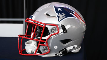A New England Patriots helmet sits on a table at Gillette