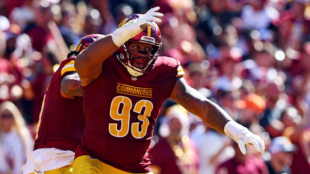 Oct 6, 2024; Landover, Maryland, USA; Washington Commanders defensive tackle Jonathan Allen (93) celebrates after a tackle during the second quarter against the Cleveland Browns at NorthWest Stadium. Mandatory Credit: Peter Casey-Imagn Images
