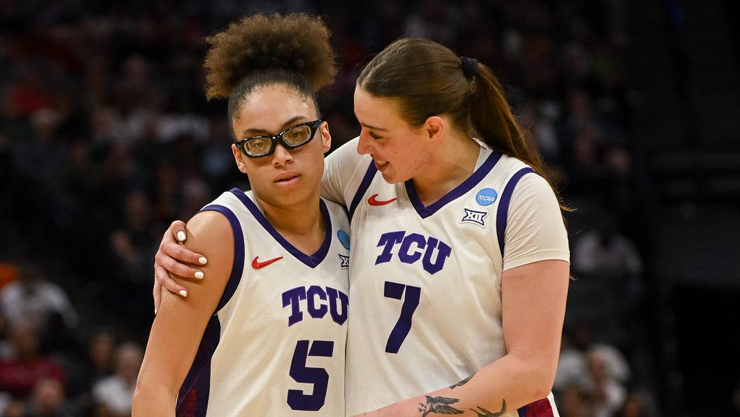 Mar 28, 2026; Sacramento, CA, USA; Texas Christian University Horned Frogs guard Olivia Miles (5) and forward Marta Suárez (7) embrace after a called foul during the second quarter of the game against the Virginia Cavaliers in the Sweet Sixteen game of the Sacramento Regional 4 of the women's 2026 NCAA Tournament at Golden 1 Center. 