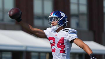 Jul 26, 2024; East Rutherford, NJ, USA; New York Giants safety Dane Belton (24) catches a pass with one hand during training camp at Quest Diagnostics Training Center. Mandatory Credit: Lucas Boland-Imagn Images